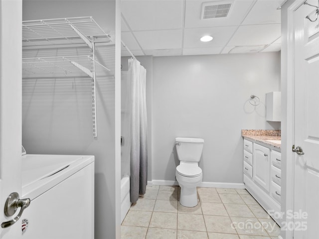 45 Avondale Heights Rd, Asheville, NC 28803 - bathroom with washer / dryer, vanity, shower / tub combo, tile patterned flooring, and a drop ceiling