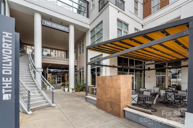 1315 E Blvd Unit 203, Charlotte, NC 28203 - view of exterior entry featuring brick siding