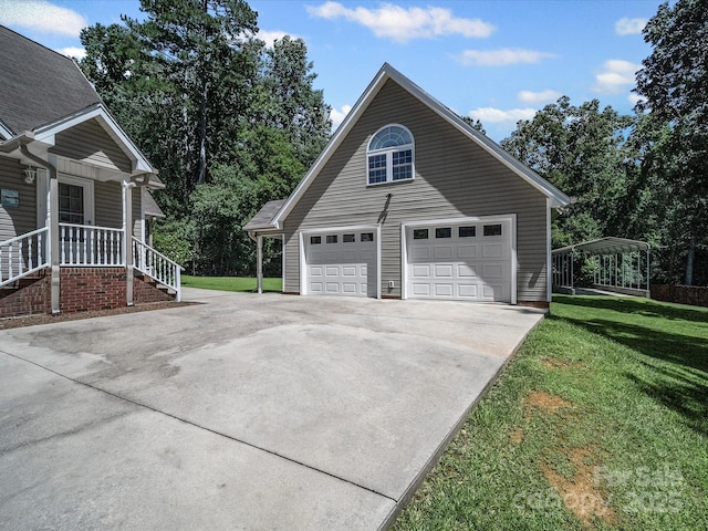179 Delwood Ct, Mount Gilead, NC 27371 - view of side of property featuring a lawn and a detached garage