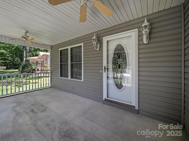 179 Delwood Ct, Mount Gilead, NC 27371 - property entrance with a ceiling fan and a porch