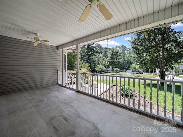 179 Delwood Ct, Mount Gilead, NC 27371 - view of patio / terrace with ceiling fan and view of wooded area