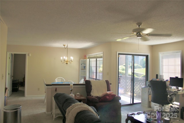 5864 Harris Grove Ln, Charlotte, NC 28212 - living room featuring a chandelier, a ceiling fan, light carpet, and a textured ceiling