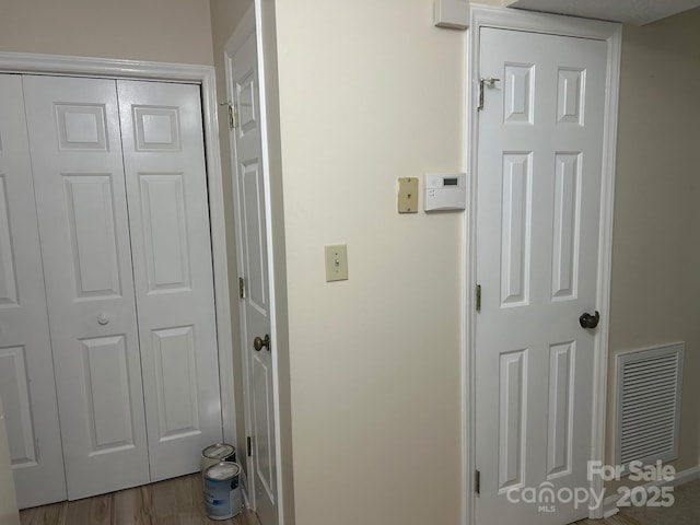 5864 Harris Grove Ln, Charlotte, NC 28212 - hallway with wood finished floors