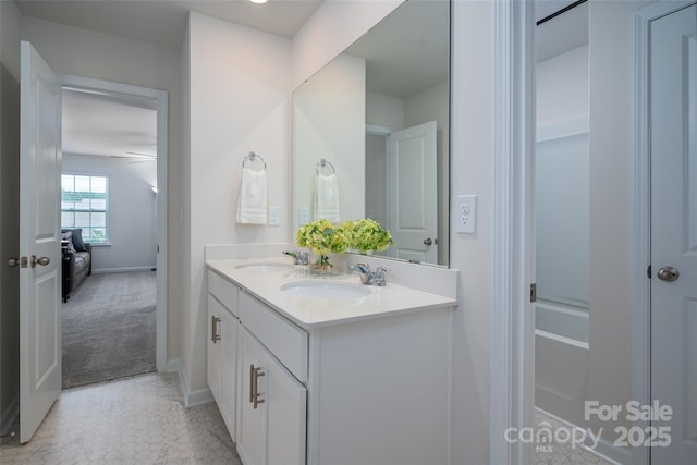 9529 Cotswood Pl, Gastonia, NC 28056 - bathroom featuring double vanity and baseboards