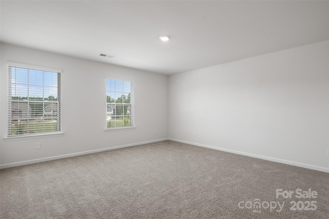 9529 Cotswood Pl, Gastonia, NC 28056 - unfurnished room with baseboards and carpet