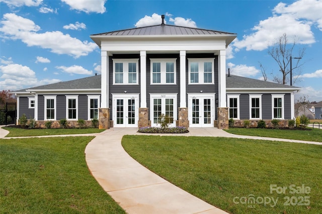 9529 Cotswood Pl, Gastonia, NC 28056 - back of property with french doors, a yard, and a standing seam roof