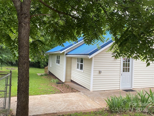 103 Hickory Hills Dr, Morganton, NC 28655 - view of home's exterior with a metal roof and a patio area