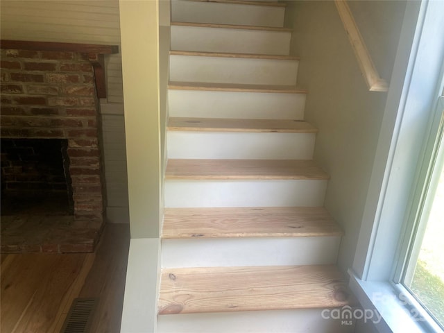 103 Hickory Hills Dr, Morganton, NC 28655 - staircase featuring a fireplace