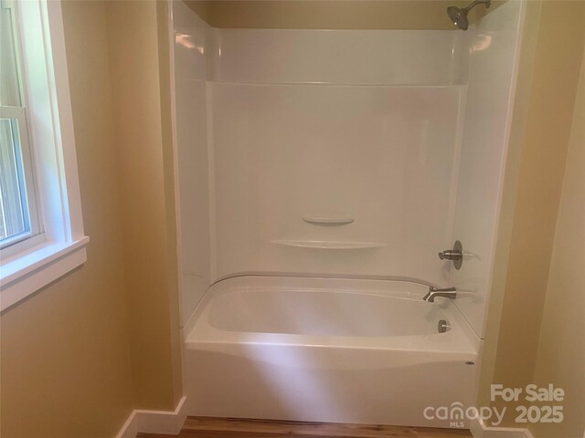 103 Hickory Hills Dr, Morganton, NC 28655 - bathroom with shower / bath combination and wood finished floors