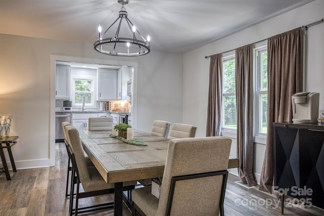 110 Camelot Dr, Granite Falls, NC 28630 - dining room with a chandelier, plenty of natural light, and dark wood-style floors