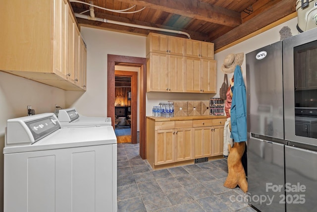 574 Locust Grove Dr, Waynesville, NC 28785 - washroom with wooden ceiling, washer and dryer, and a wood stove