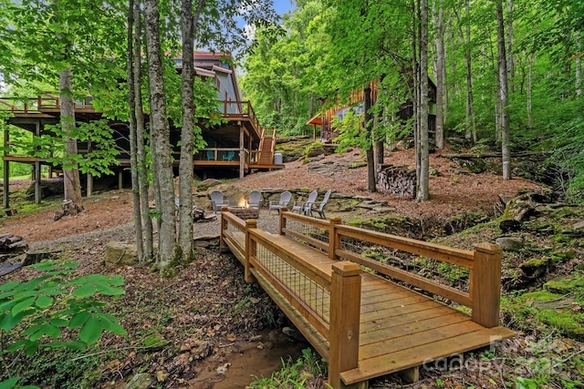 574 Locust Grove Dr, Waynesville, NC 28785 - wooden deck featuring stairway and an outdoor fire pit