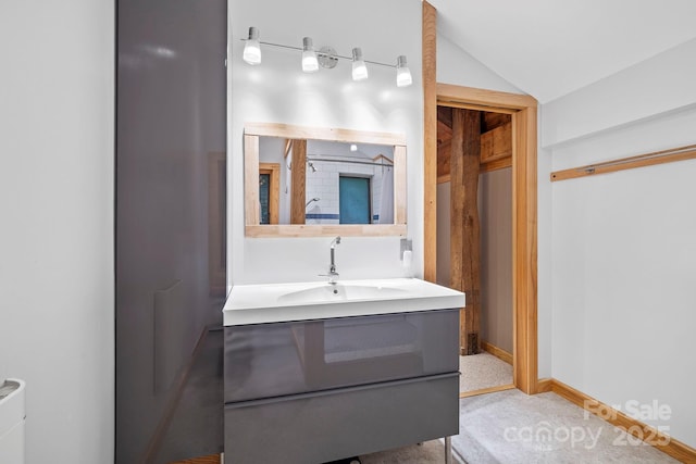 574 Locust Grove Dr, Waynesville, NC 28785 - bathroom with vanity and lofted ceiling
