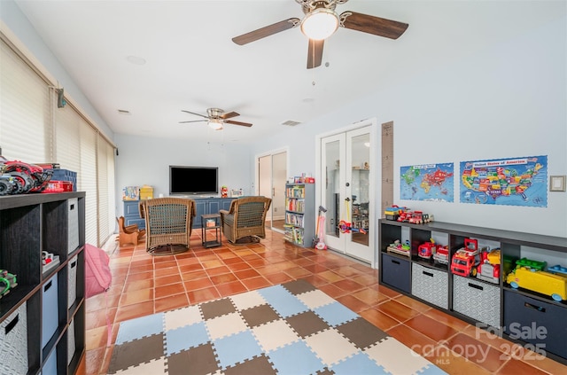 3041 Shallowood Ln, Charlotte, NC 28277 - recreation room featuring ceiling fan, tile patterned flooring, and french doors
