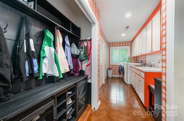 3041 Shallowood Ln, Charlotte, NC 28277 - laundry room featuring light tile patterned flooring, washer and dryer, recessed lighting, and cabinet space