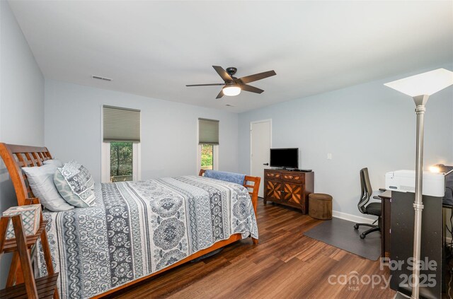 3041 Shallowood Ln, Charlotte, NC 28277 - bedroom with wood finished floors, a ceiling fan, and an office area