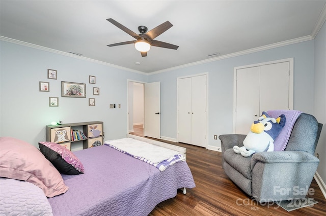 3041 Shallowood Ln, Charlotte, NC 28277 - bedroom with wood finished floors, multiple closets, ornamental molding, and a ceiling fan