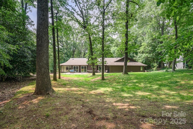 3041 Shallowood Ln, Charlotte, NC 28277 - view of green lawn featuring a patio area