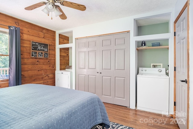 2266 Sugar Mountain Rd, Newland, NC 28657 - bedroom with wood finished floors, a closet, ceiling fan, and a textured ceiling