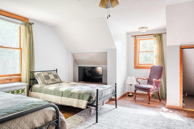 2266 Sugar Mountain Rd, Newland, NC 28657 - bedroom with wood finished floors and lofted ceiling