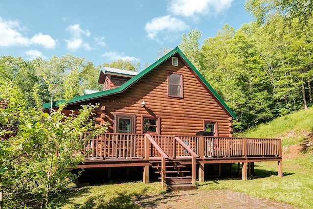 2266 Sugar Mountain Rd, Newland, NC 28657 - rear view of property featuring log siding, a wooden deck, and a metal roof