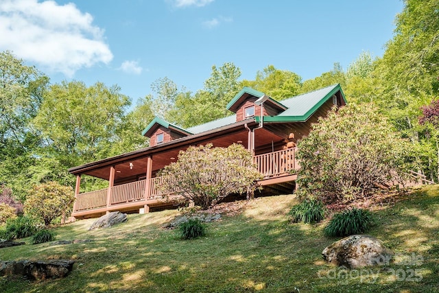 2266 Sugar Mountain Rd, Newland, NC 28657 - rear view of property featuring a lawn and a wooden deck