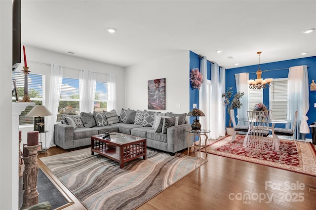 2473 Riparian Way, Denver, NC 28037 - living room featuring a chandelier, wood finished floors, and recessed lighting