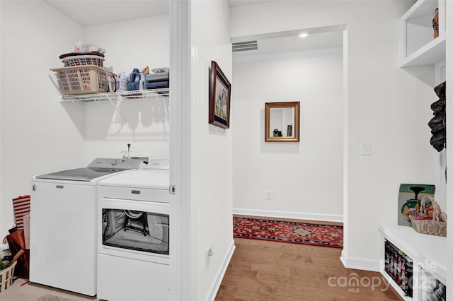 2473 Riparian Way, Denver, NC 28037 - laundry room featuring washer and dryer and wood finished floors