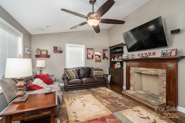 4441 Jim Wise Rd, Lincolnton, NC 28092 - living area with ceiling fan, a fireplace, lofted ceiling, and wood finished floors