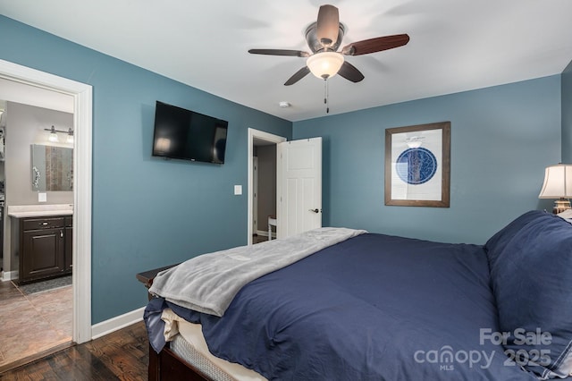 4441 Jim Wise Rd, Lincolnton, NC 28092 - bedroom featuring dark wood-style floors, ensuite bath, and a ceiling fan