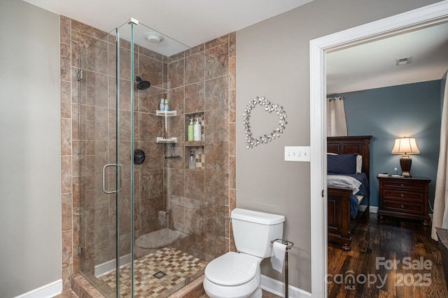 4441 Jim Wise Rd, Lincolnton, NC 28092 - bathroom featuring ensuite bathroom, a shower stall, and wood finished floors