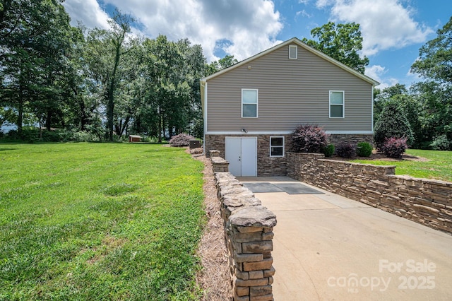 4441 Jim Wise Rd, Lincolnton, NC 28092 - rear view of property featuring stone siding and a lawn