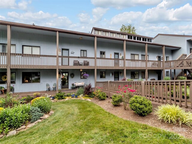 87 Willow Rd Unit D-4, Waynesville, NC 28786 - back of property featuring a lawn