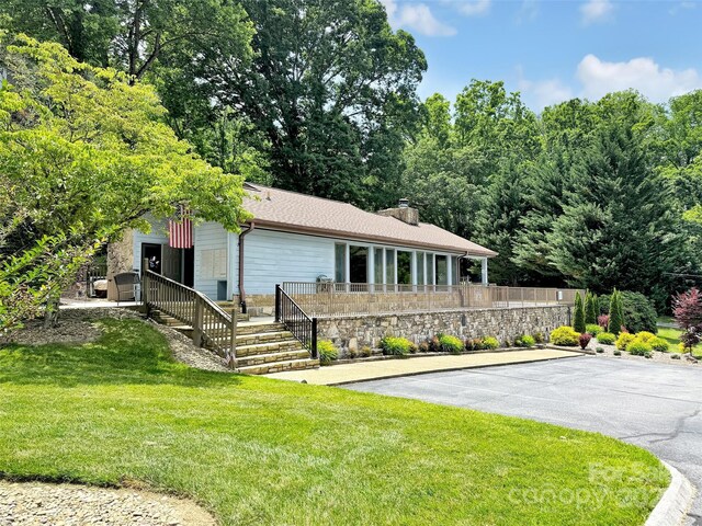 87 Willow Rd Unit D-4, Waynesville, NC 28786 - view of front of home featuring a front yard and a chimney