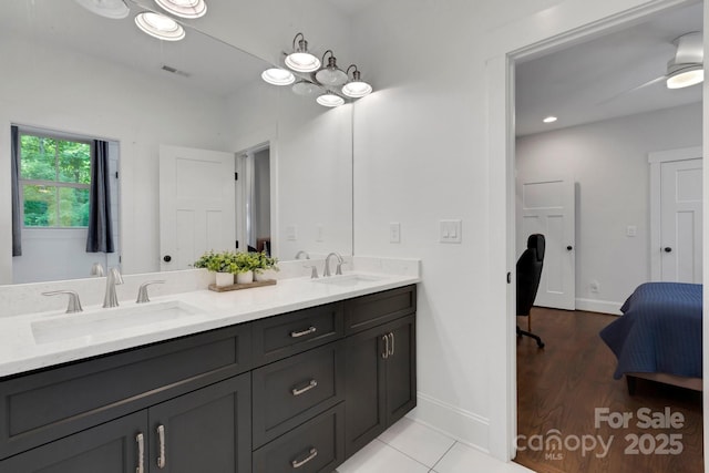 2122 Goose Creek Farm Ln, Indian Trail, NC 28079 - bathroom featuring double vanity and wood finished floors