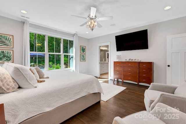 2122 Goose Creek Farm Ln, Indian Trail, NC 28079 - bedroom with wood finished floors, recessed lighting, ceiling fan, connected bathroom, and crown molding