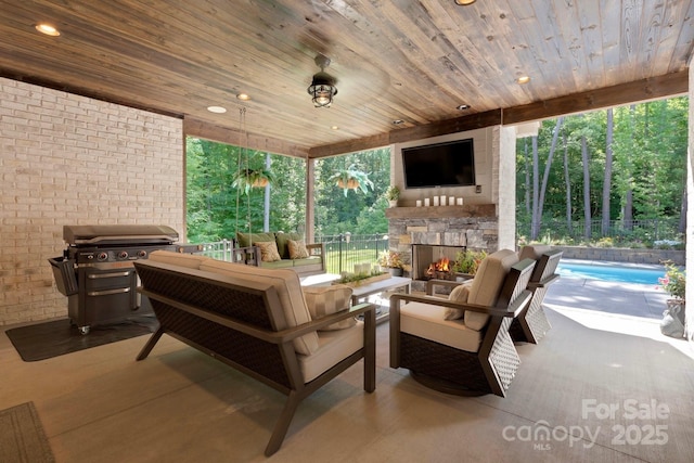 2122 Goose Creek Farm Ln, Indian Trail, NC 28079 - view of patio with an outdoor living space with a fireplace and a grill