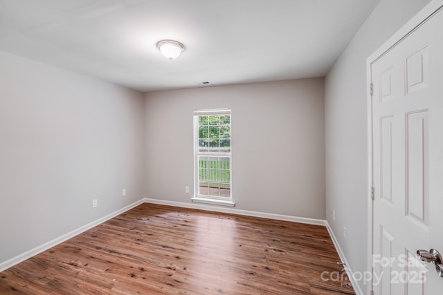 9000 Vagabond Rd, Charlotte, NC 28227 - spare room featuring wood finished floors