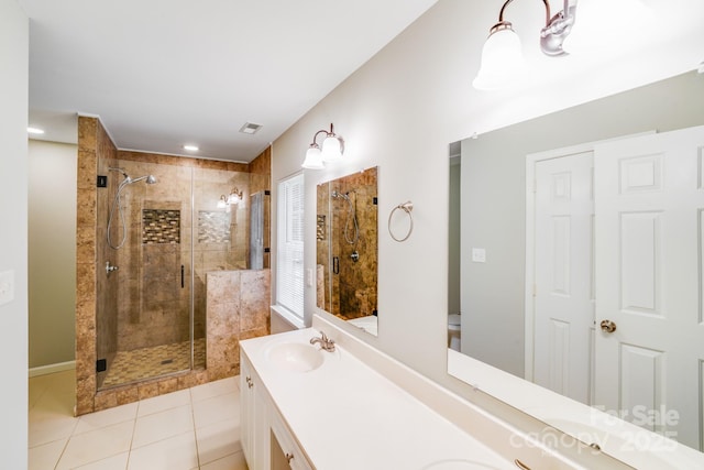 9000 Vagabond Rd, Charlotte, NC 28227 - full bathroom featuring a shower stall, double vanity, and tile patterned flooring