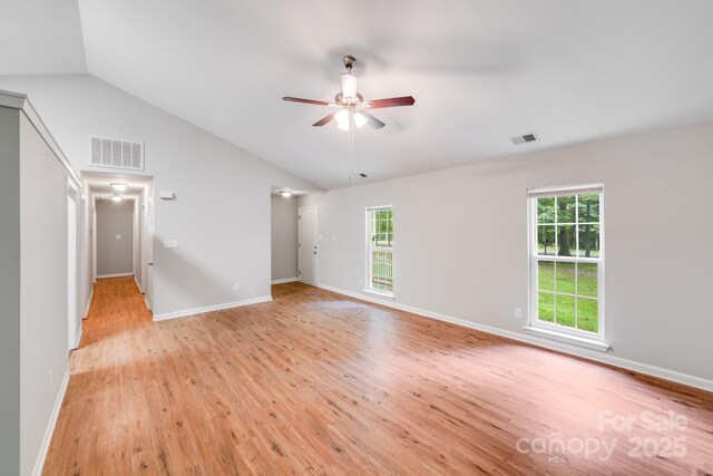 9000 Vagabond Rd, Charlotte, NC 28227 - spare room featuring lofted ceiling, light wood-style floors, plenty of natural light, and ceiling fan