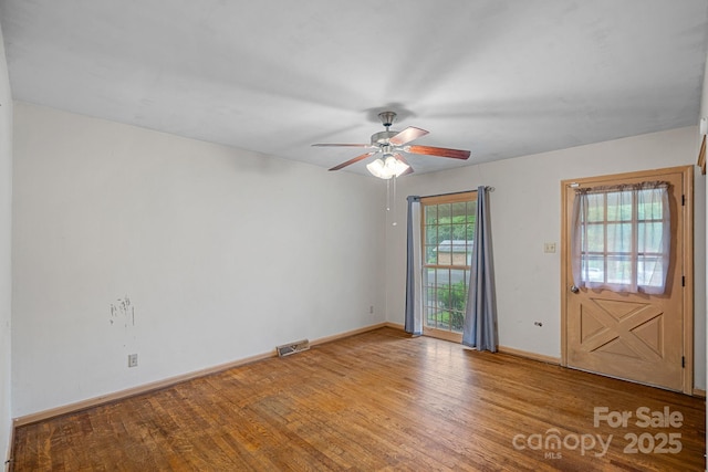 807 Claremont Rd, Charlotte, NC 28214 - unfurnished room with ceiling fan and wood finished floors