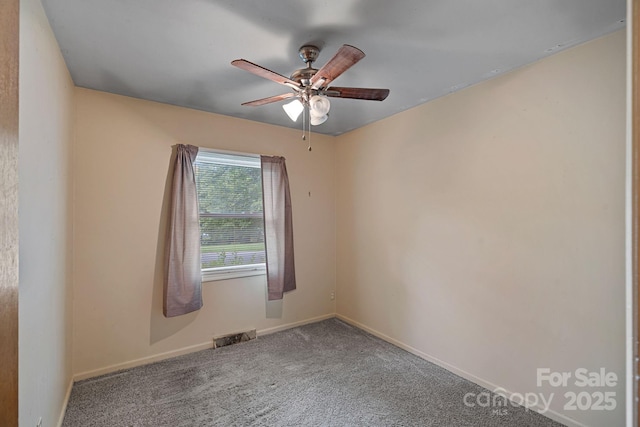 807 Claremont Rd, Charlotte, NC 28214 - carpeted spare room featuring a ceiling fan and baseboards