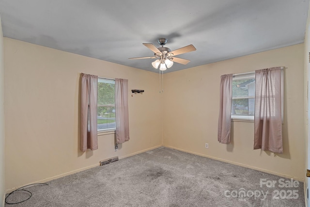 807 Claremont Rd, Charlotte, NC 28214 - carpeted spare room with ceiling fan and baseboards