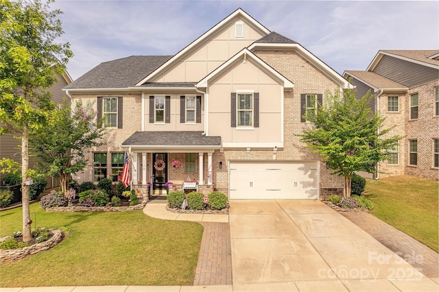 1178 Arges River Dr, Fort Mill, SC 29715 - craftsman-style house featuring brick siding, concrete driveway, a front lawn, covered porch, and an attached garage