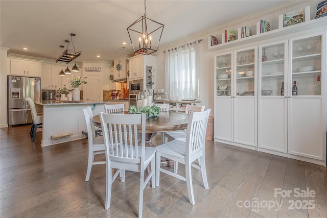 1178 Arges River Dr, Fort Mill, SC 29715 - dining room featuring dark wood-style flooring, ornamental molding, a chandelier, and recessed lighting