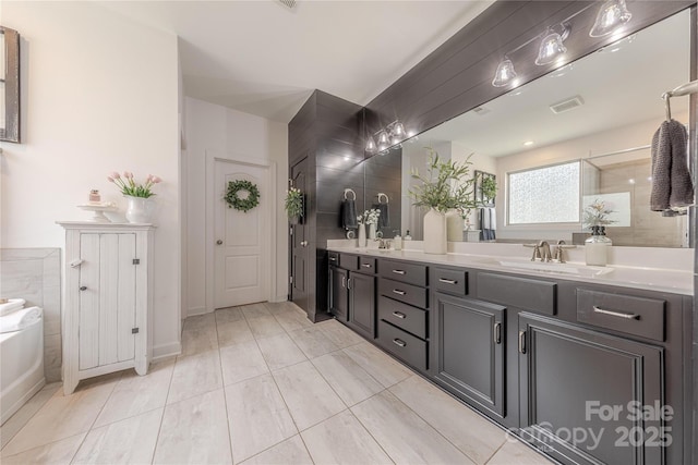 1178 Arges River Dr, Fort Mill, SC 29715 - bathroom featuring double vanity and a tub to relax in