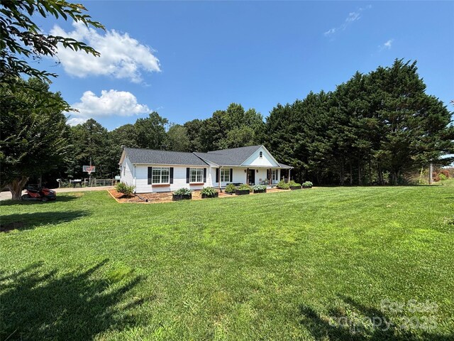 8122 Hutchison Ln, Vale, NC 28168 - ranch-style house featuring a front lawn
