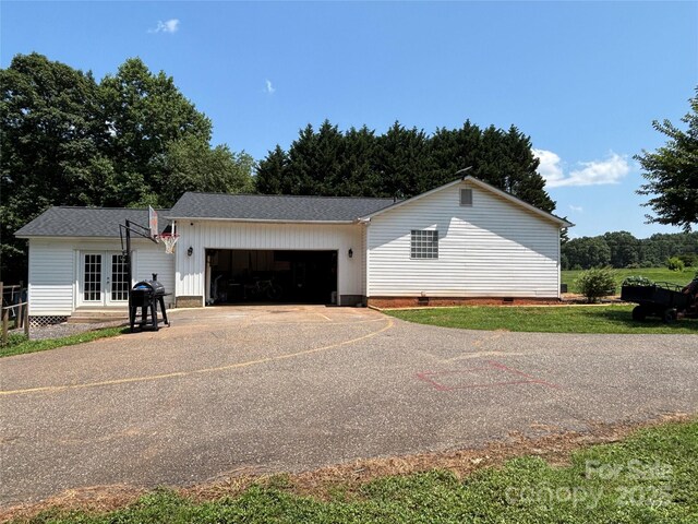 8122 Hutchison Ln, Vale, NC 28168 - view of front of property with asphalt driveway, french doors, a garage, crawl space, and roof with shingles