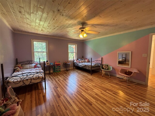 8122 Hutchison Ln, Vale, NC 28168 - bedroom with crown molding, wood finished floors, wooden ceiling, and ceiling fan