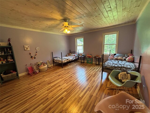 8122 Hutchison Ln, Vale, NC 28168 - bedroom with ornamental molding, wood finished floors, wooden ceiling, and ceiling fan